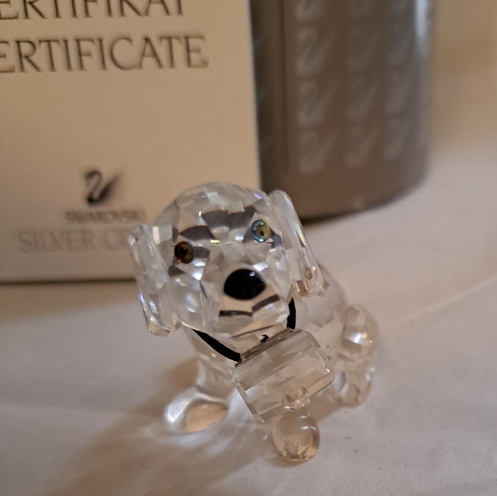 Swarovski St Bernard puppy with  barrel in original box and COA excellent